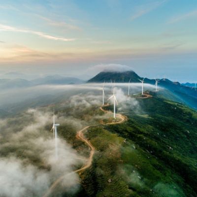 Windfarms sit along a ridgeline.